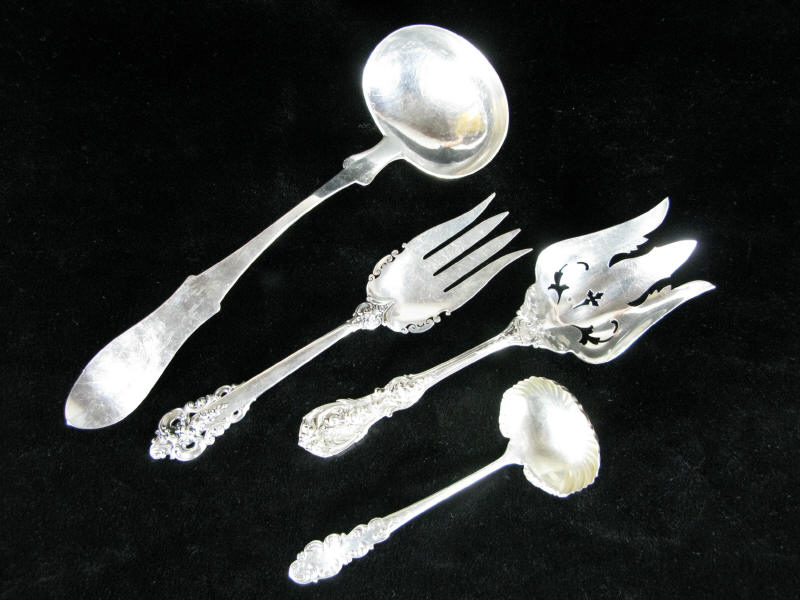 Appraisal: Four Sterling Silver Serving Pieces the first a large pierced