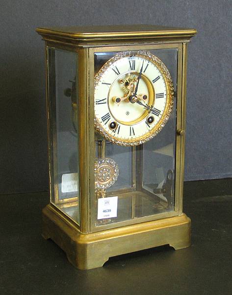 Appraisal: An Ansonia brass and glass 'Prism' model regulator clock first