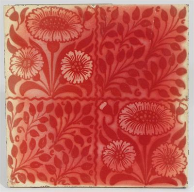 Appraisal: A William De Morgan tile painted in ruby with flower