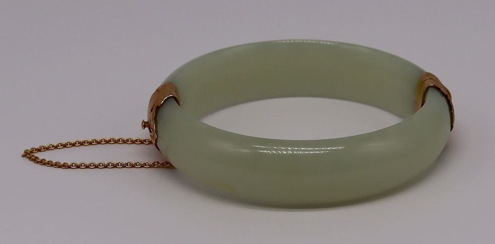 Appraisal: JEWELRY Ming's kt Gold Mounted Celadon Jade Bracelet Ming's kt