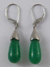 Appraisal: A pair of green hardstone drop earrings with white metal