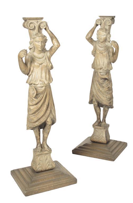 Appraisal: A pair of carved oak female terms