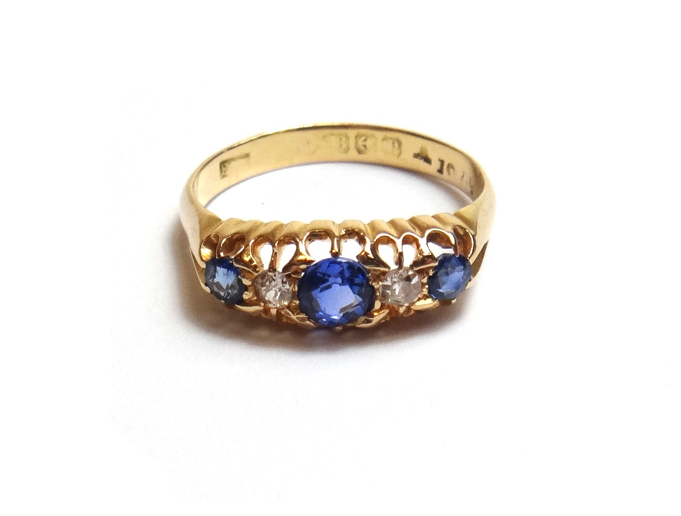 Appraisal: An ct gold sapphire and diamond set five stone ring