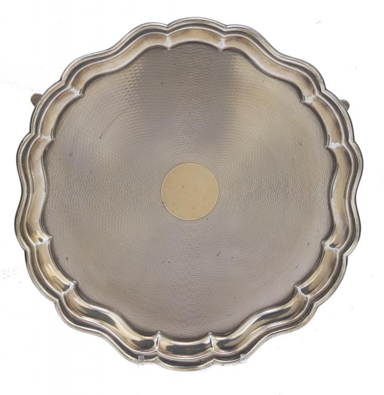 Appraisal: A GEORGE V SALVER the engine turned field in moulded