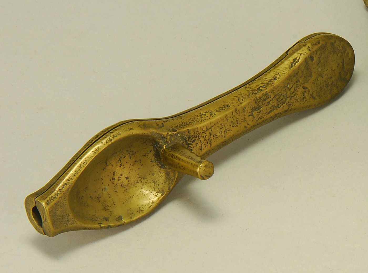 Appraisal: ANTIQUE BRASS SPOON MOLDLate th Early th CenturyTogether with a