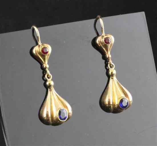 Appraisal: A pair of gold sapphire and ruby set drop earrings