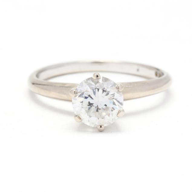 Appraisal: WHITE GOLD AND ROUND BRILLIANT CUT DIAMOND RING Centered on