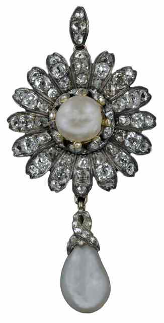 Appraisal: A pearl and diamond pendant brooch of flowerhead form centred