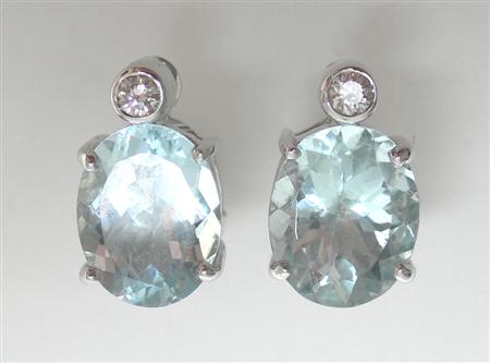 Appraisal: A pair of contemporary aquamarine and diamond earrings each composed