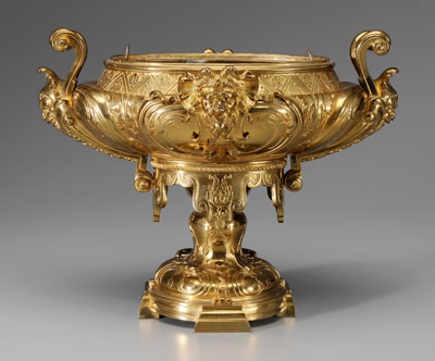 Appraisal: Gilt bronze centerpiece urn with mask and scroll handl