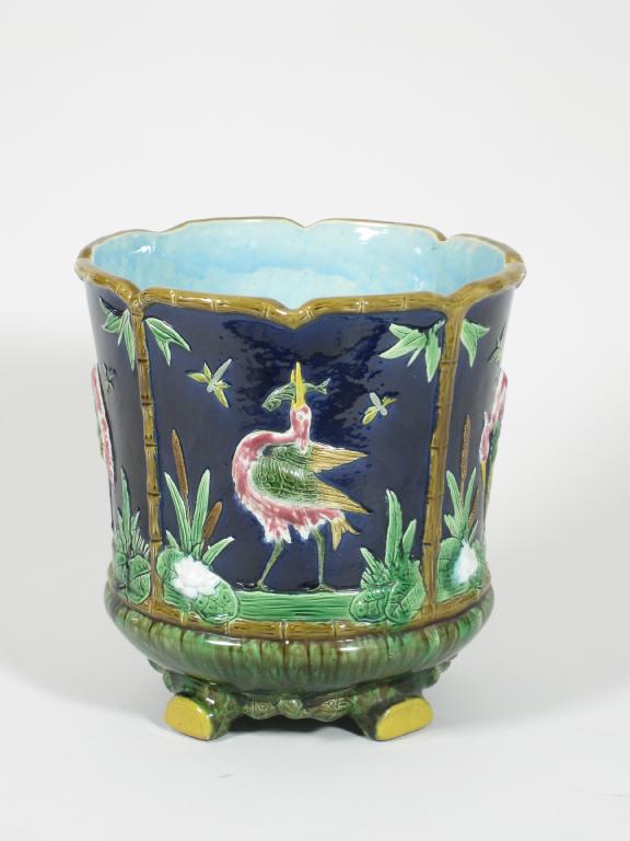 Appraisal: A majolica large Jardiniere moulded reserves of storks amongst lilies