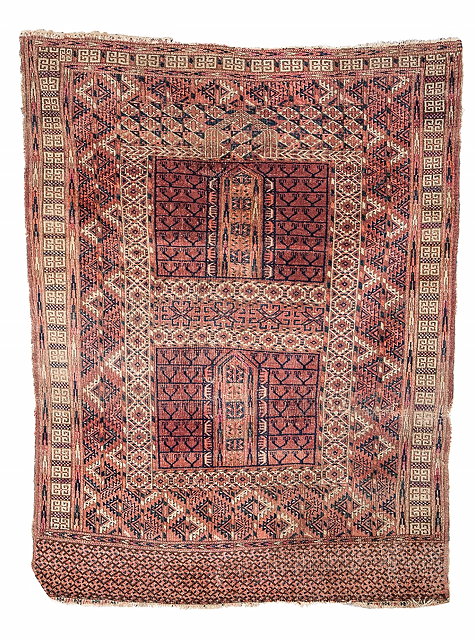 Appraisal: A TEKKE TURKOMAN ENGSI with central 'candelabra' decoration within a