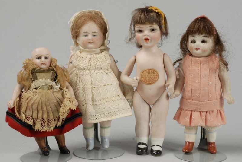 Appraisal: Lot of German All Bisque Dolls Description Hertwig with blue