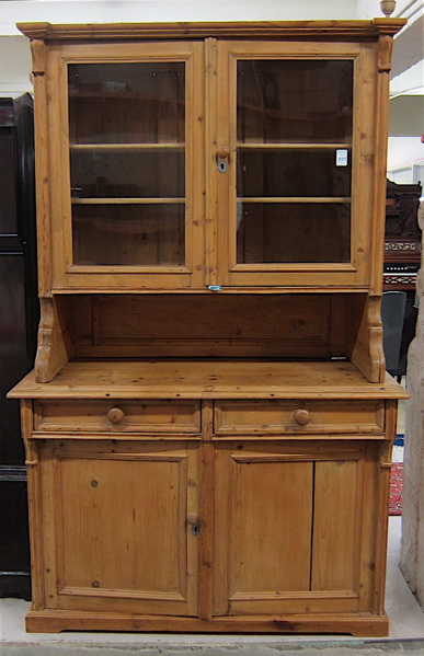 Appraisal: PINE DISPLAY CABINET ON CUPBOARD Continental th century elements the