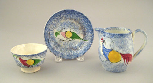 Appraisal: Blue spatter creamer th c with peafowl together with a