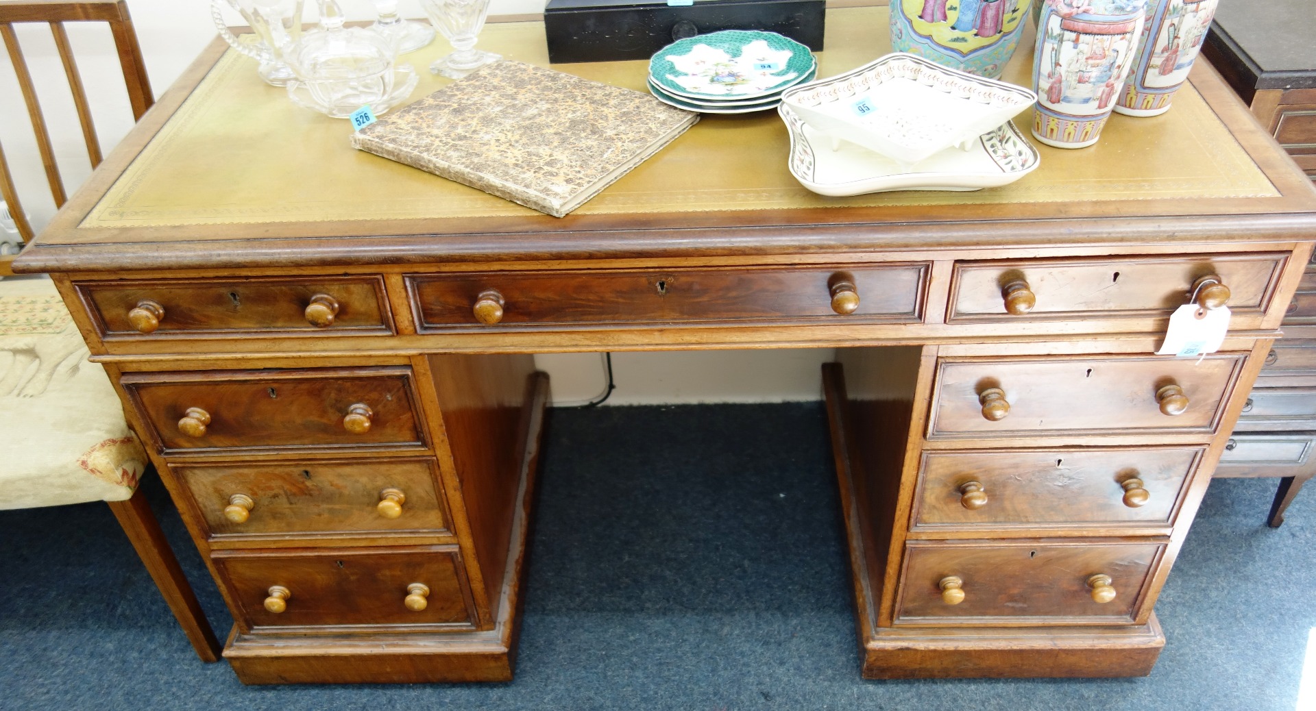 Appraisal: A Victorian mahogany kneehole desk stamped 'Smith Co Bristol '