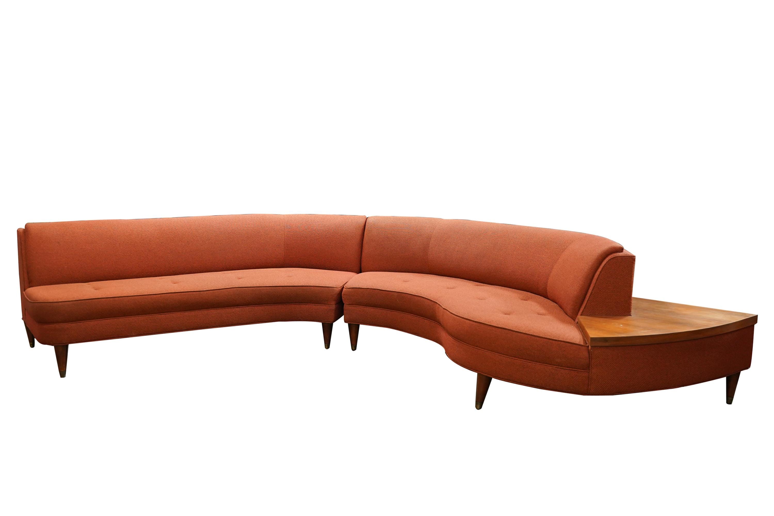 Appraisal: MID-CENTURY MODERN SECTIONAL SOFA unsigned in two parts covered with