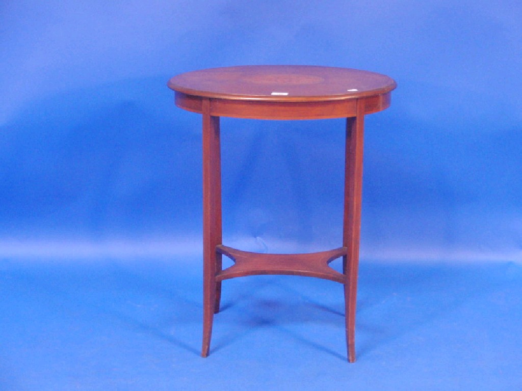 Appraisal: An Edwardian inlaid mahogany occasional table