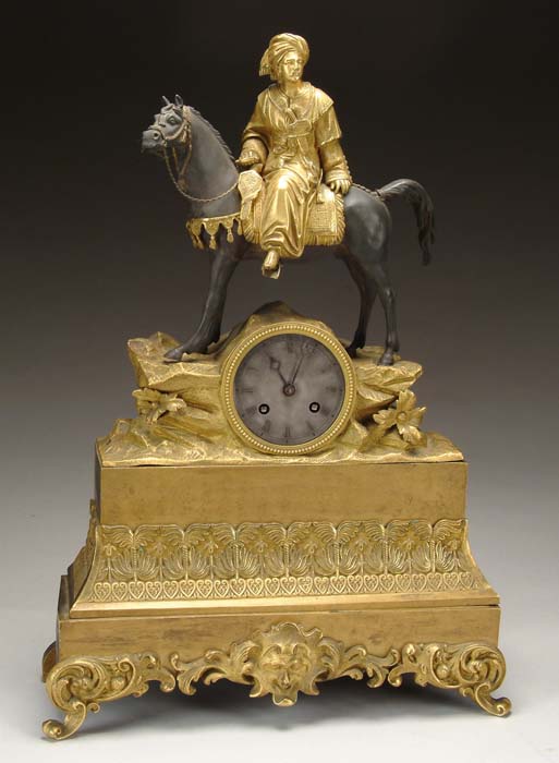 Appraisal: EARLY TH CENTURY BRONZE AND GILT DORE FIGURAL MANTLE CLOCK