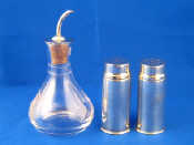 Appraisal: A silver pepper and salt shaped as cartridges stamped wt