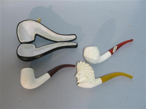 Appraisal: THREE MEERSCHAUM PIPES The first carved with an Indian's bust