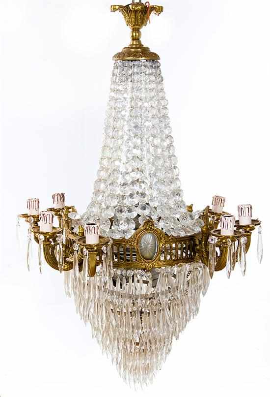 Appraisal: Regency style gilt-metal and crystal chandelier pierced-metal band with oval