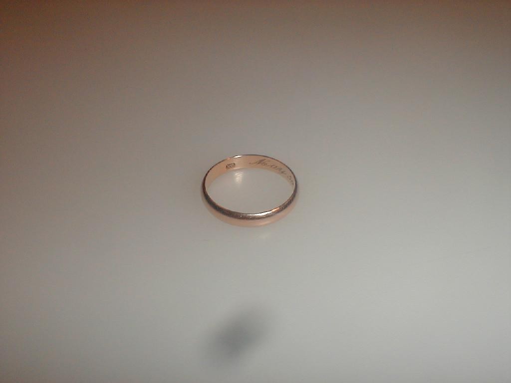 Appraisal: A wedding band stamped g