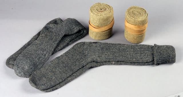 Appraisal: WWI clothing pair Infantry socks and pair wool leg wraps