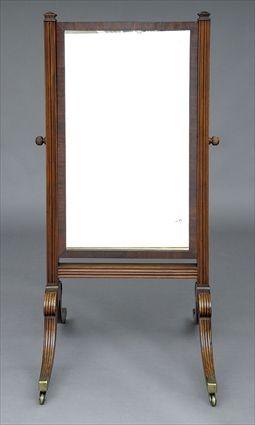 Appraisal: REGENCY CARVED MAHOGANY CHEVAL MIRROR The rectangular plate on molded