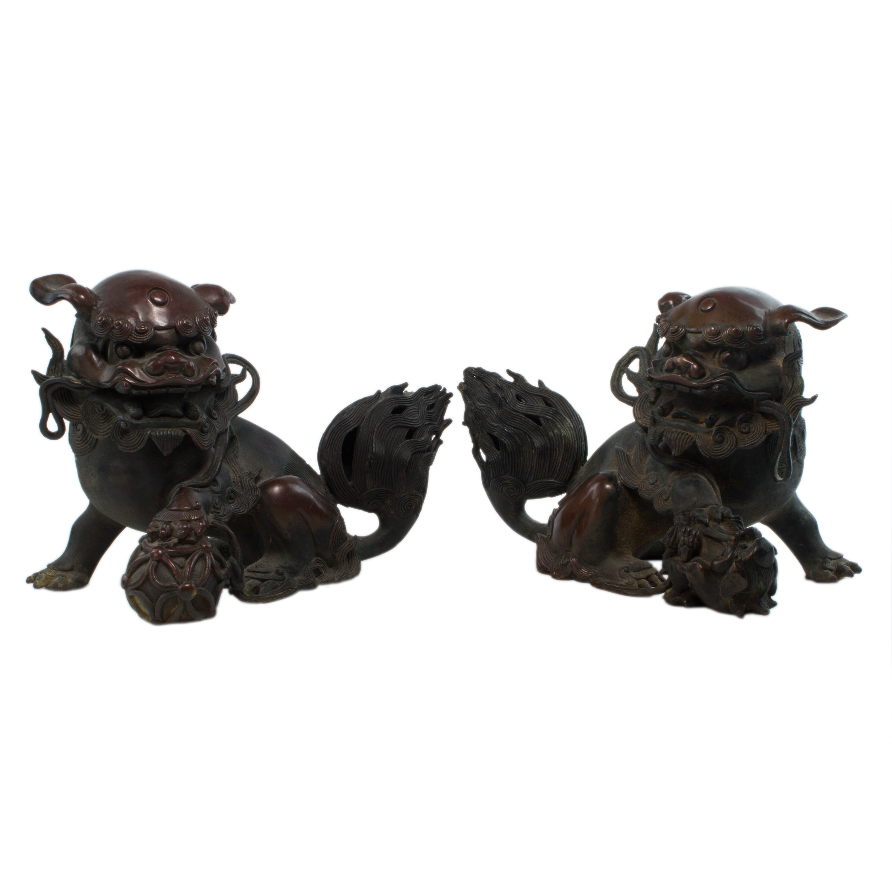 Appraisal: PAIR OF CHINESE BRONZE GUARDIAN LIONS Pair of Chinese bronze