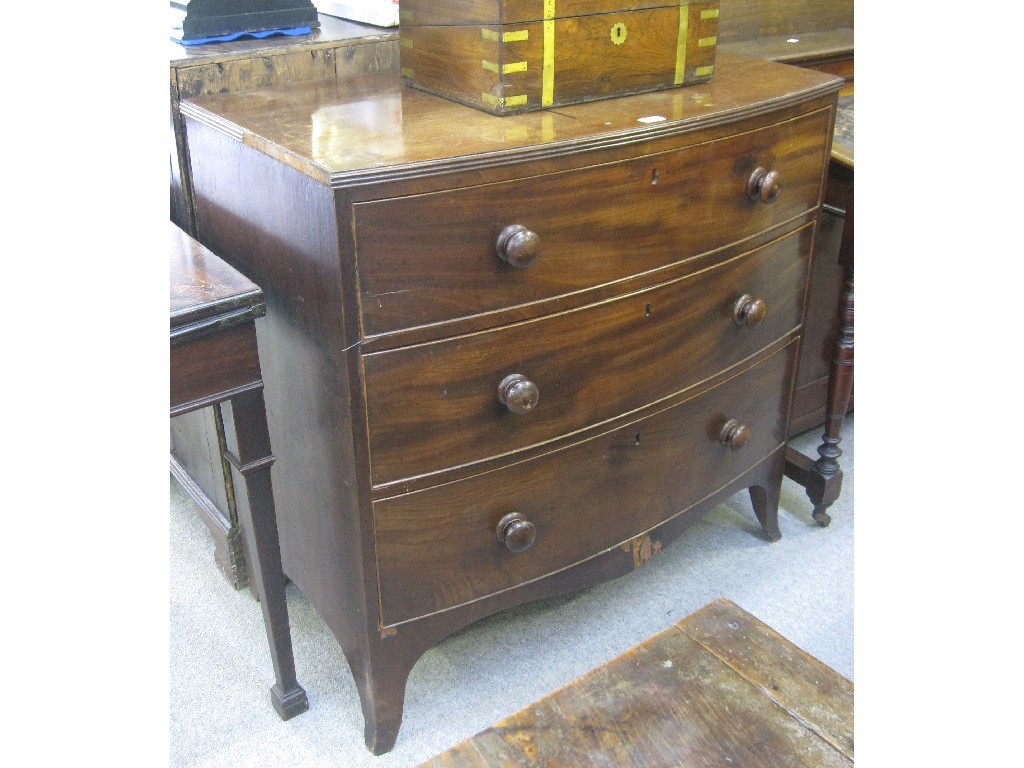 Appraisal: Victorian mahogany bow fronted three-drawer chest with shaped apron