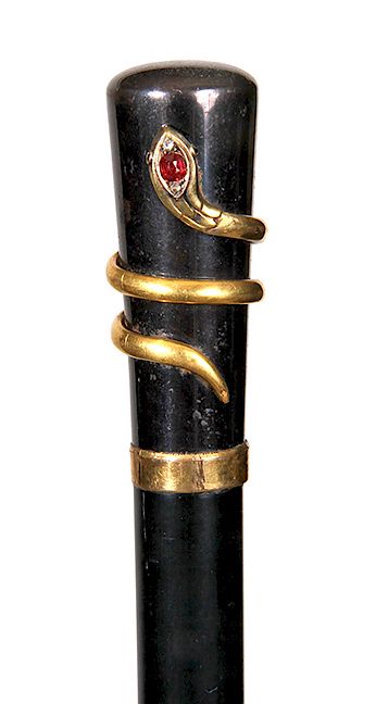 Appraisal: Snake Dress Cane- Ca - A silver metal handle with