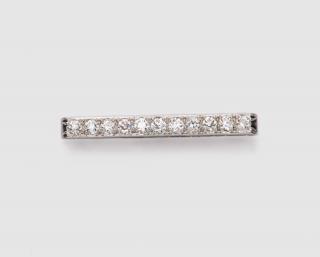 Appraisal: Platinum and Diamond Bar Brooch PLATINUM AND DIAMOND BAR BROOCHbead-set