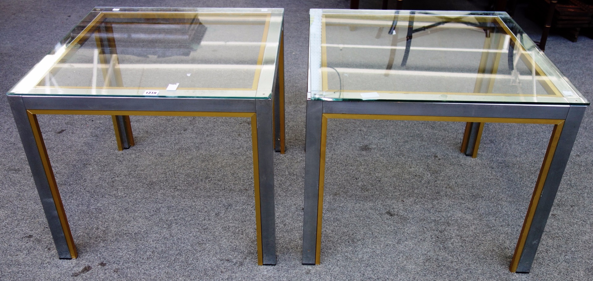 Appraisal: A pair of Albrizzi chrome and lacquered brass side tables