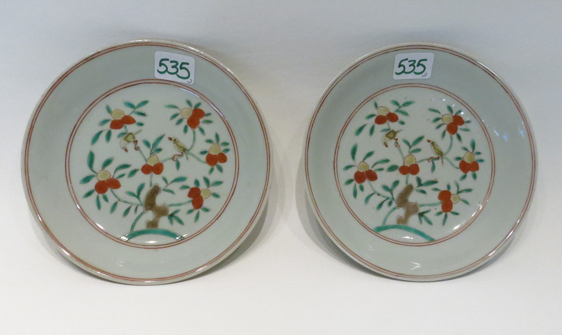 Appraisal: TWO CHINESE PORCELAIN DISHES the central reserves decorated with birds