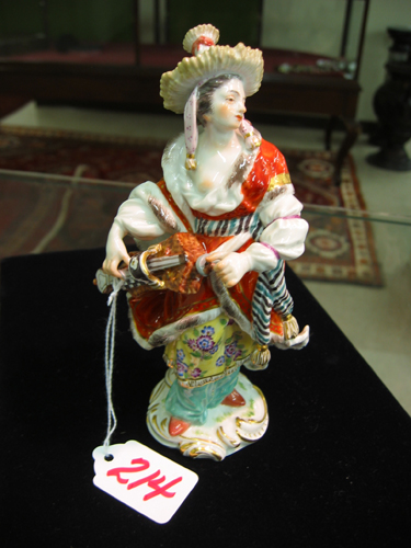 Appraisal: MEISSEN PORCELAIN FIGURE woman in colorful th century style costume