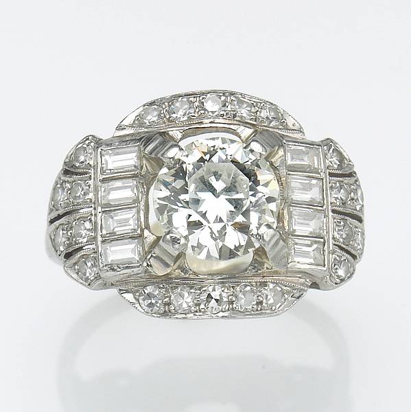 Appraisal: An art deco diamond platinum and k white gold ring