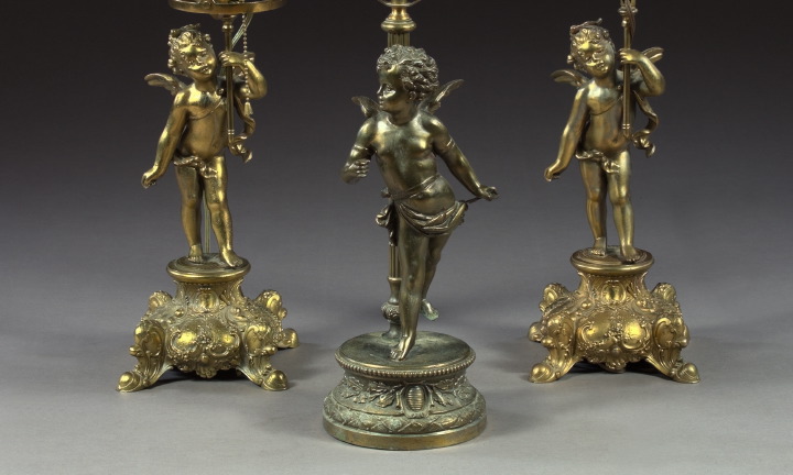 Appraisal: Pair of Gilded Spelter and Brass Putto Accent Lamps in