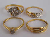 Appraisal: Four yellow metal tests carat gold diamond rings gross weight