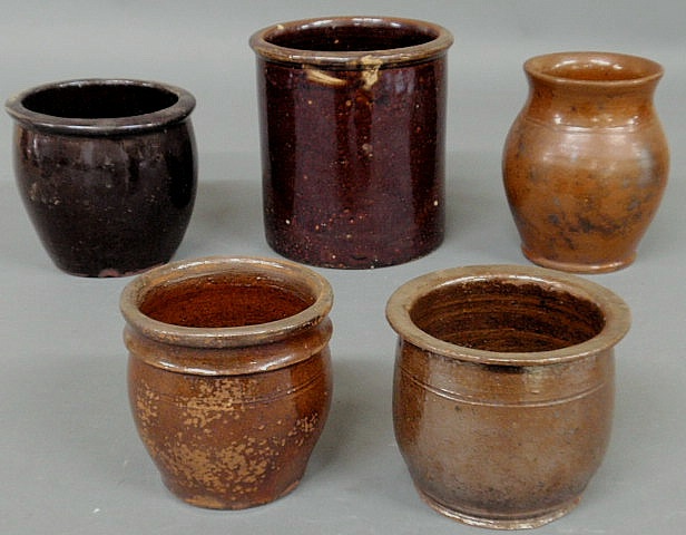 Appraisal: Five th c Pennsylvania redware jars largest h