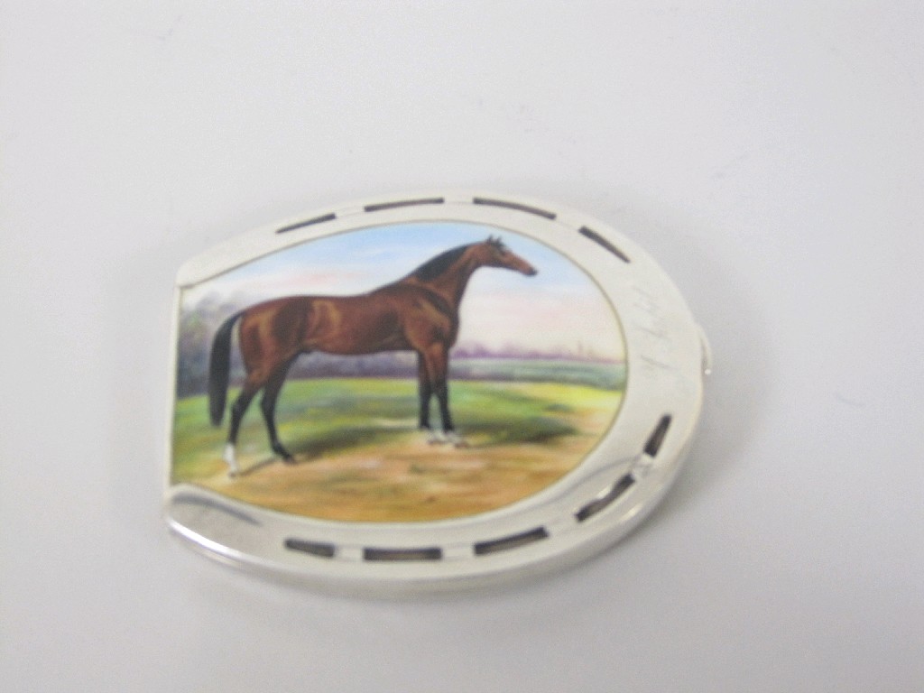 Appraisal: A Continental silver and enamel Horseshoe Cigarette Case with bay