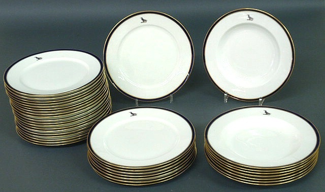 Appraisal: Set of Cauldon English china with cobalt rims and bird