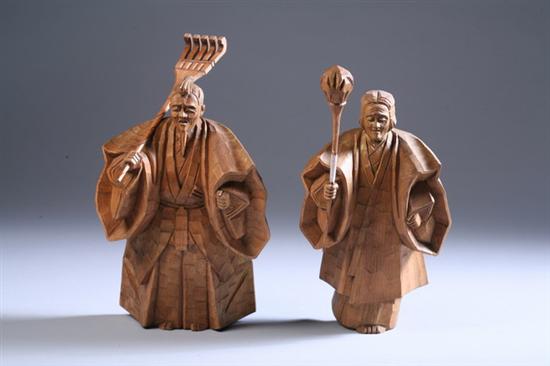 Appraisal: TWO JAPANESE WOOD FEMALE AND MALE FIGURES Signed in fitted