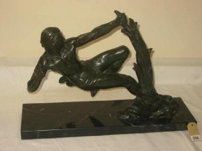 Appraisal: AN ART DECO STYLE BRONZE of a male athlete modelled