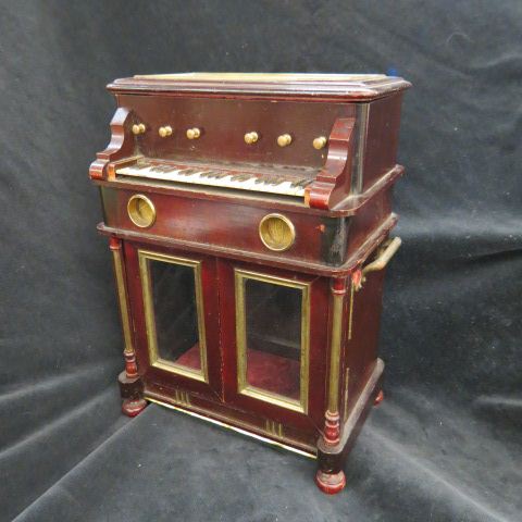 Appraisal: Mechanical Music Box Piano Jewelry Cabinet circa with top box