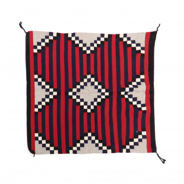 Appraisal: NAVAJO RUG Blue and red stripes with repeating grey diamond