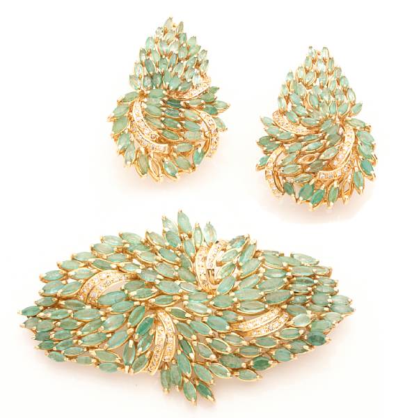 Appraisal: An emerald diamond and k gold foliate brooch with matching