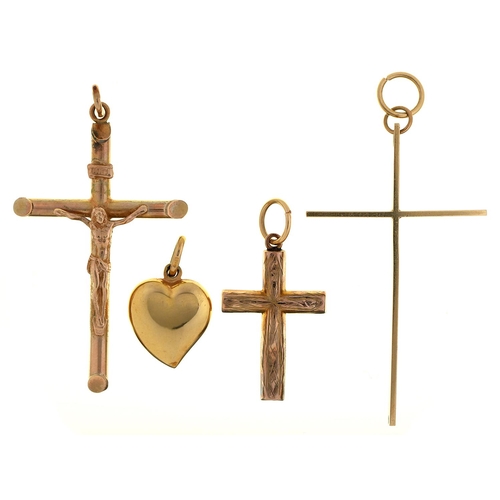 Appraisal: A ct gold crucifix and two crosses various sizes and