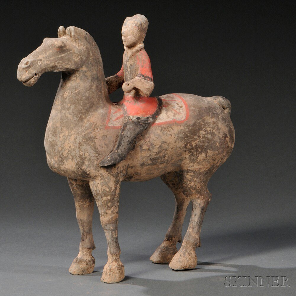 Appraisal: Pottery Horse and Rider China Han Dynasty style the finely