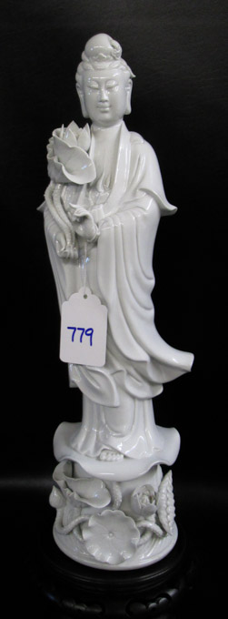 Appraisal: CHINESE PORCELAIN FIGURINE OF KUAN YIN in standing pose holding